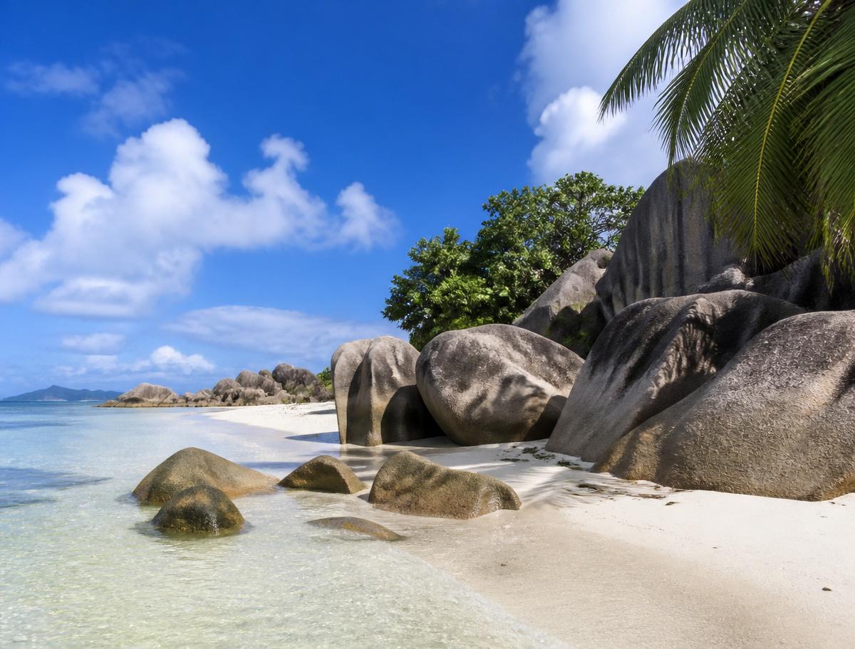 Granite boulders and pale sand — La Digue's calling card.