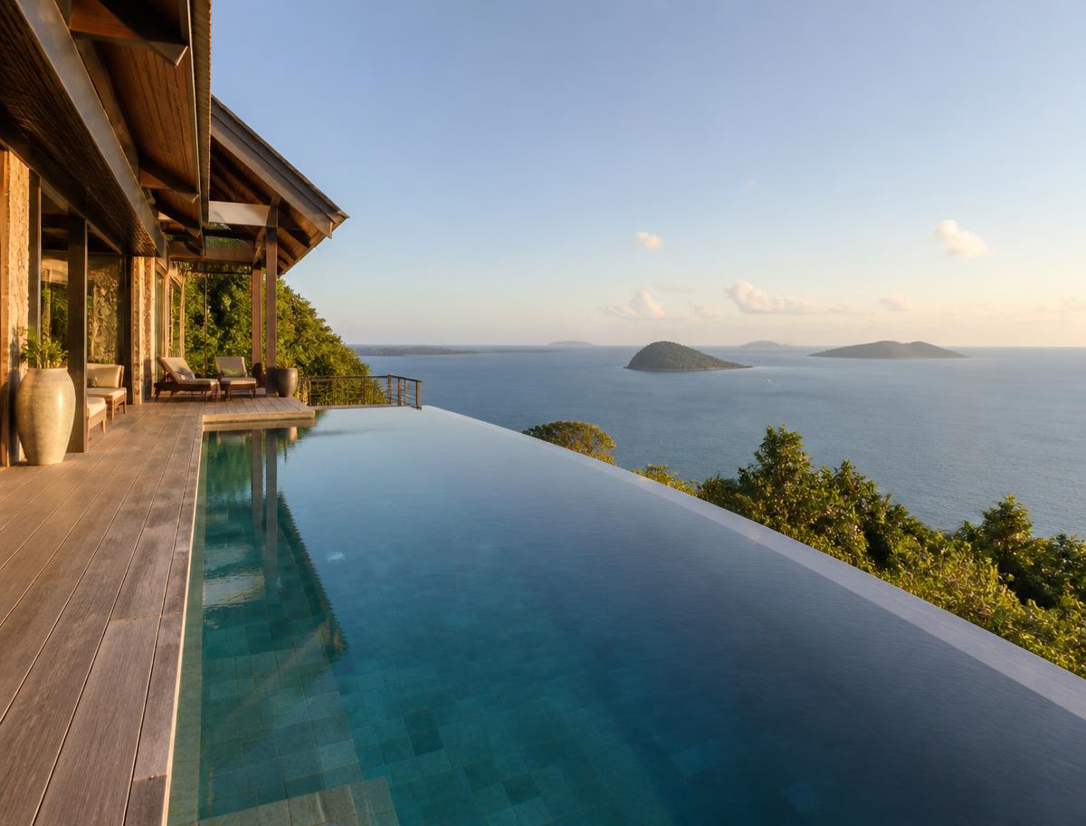 Cliff-top pool villa looking over the inner islands.