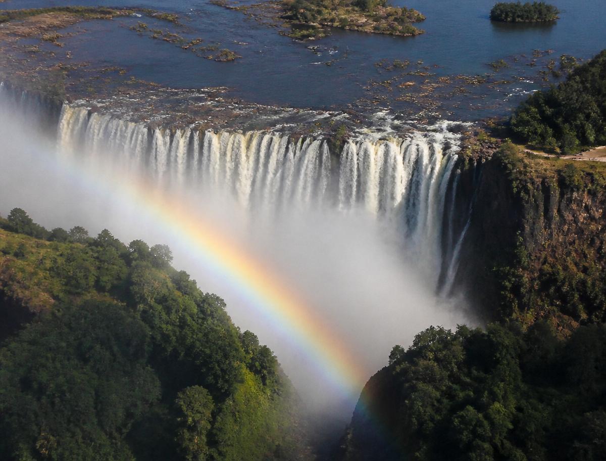 The full curtain in flood — and the rainbow that comes with it.